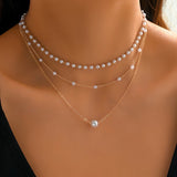 Trinity Pearl Layer Necklace -korusetti