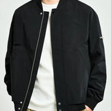Minimalistinen bomber-takki